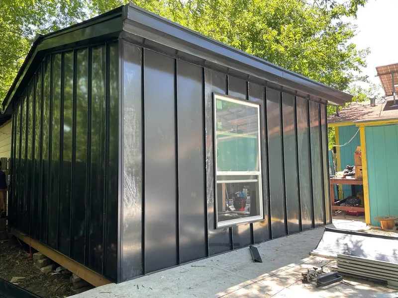 Black standing seam metal wall panels for Roof Inspection in St. Helena